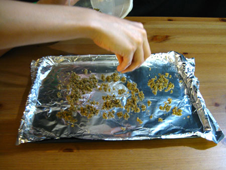 Spread out the cannabis on a baking sheet and bake it!