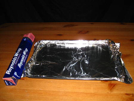Line baking sheet with aluminum foil.