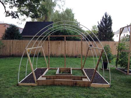 View of cheap greenhouse when it's about halfway done