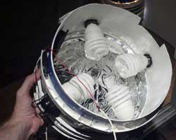 When building your space bucket, a horizontal light configuration will make better use of your CFL grow lights